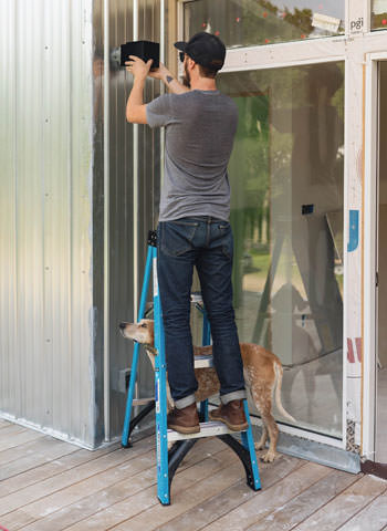 Theron installing outdoor lighting photo